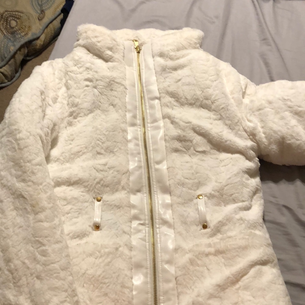White furry jacket